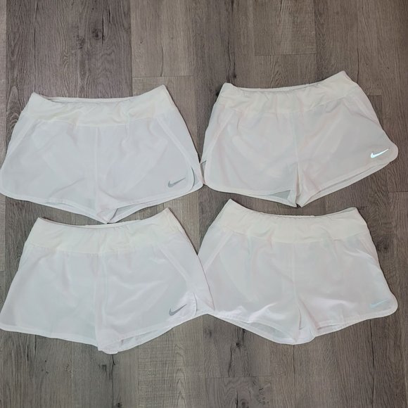 Nike dri fit white running shorts set of 4. pocket on back with lining size Larg - Picture 7 of 13